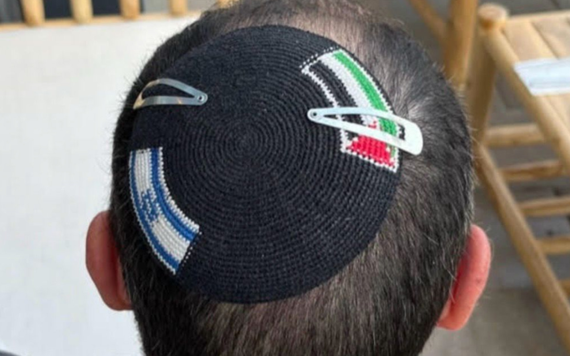 Israeli police cut Palestinian flag from lecturers kippah after detaining him