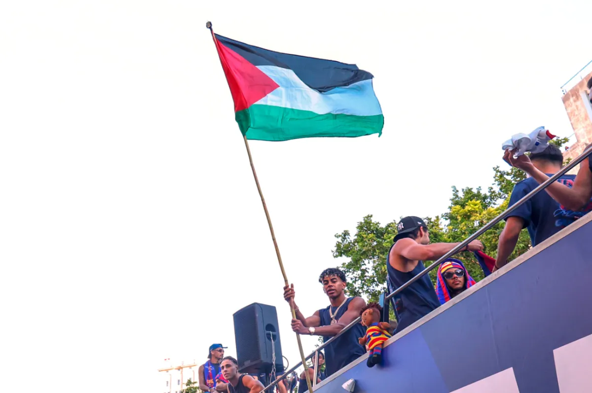 Barcelona Star Lamine Yamal Waves Palestinian Flag during Title Parade